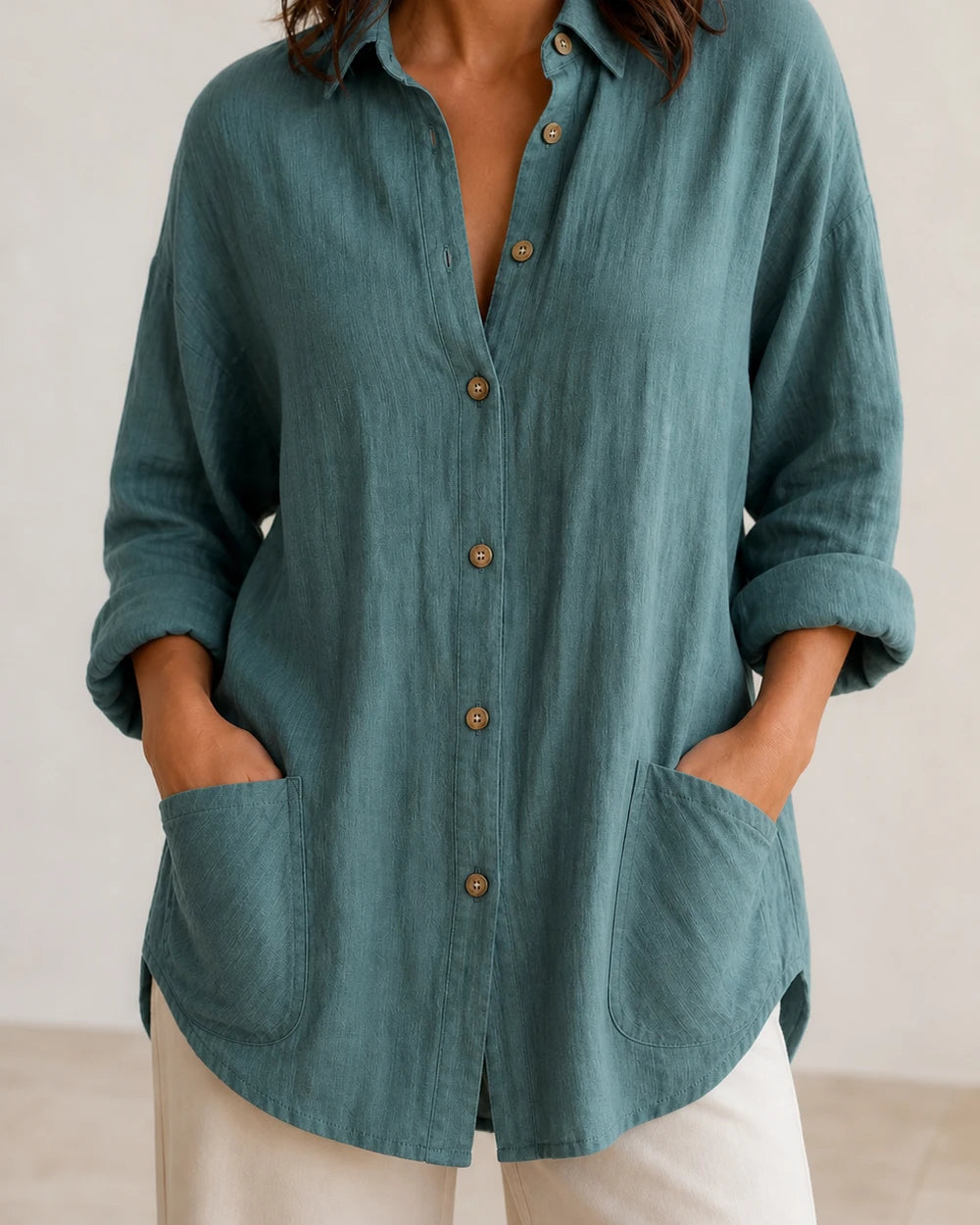 Women's lake green relaxed longline shirt, front product view.